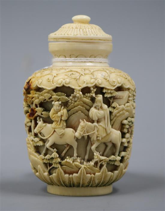 A 19th century Chinese ivory snuff bottle and stopper H.9cm